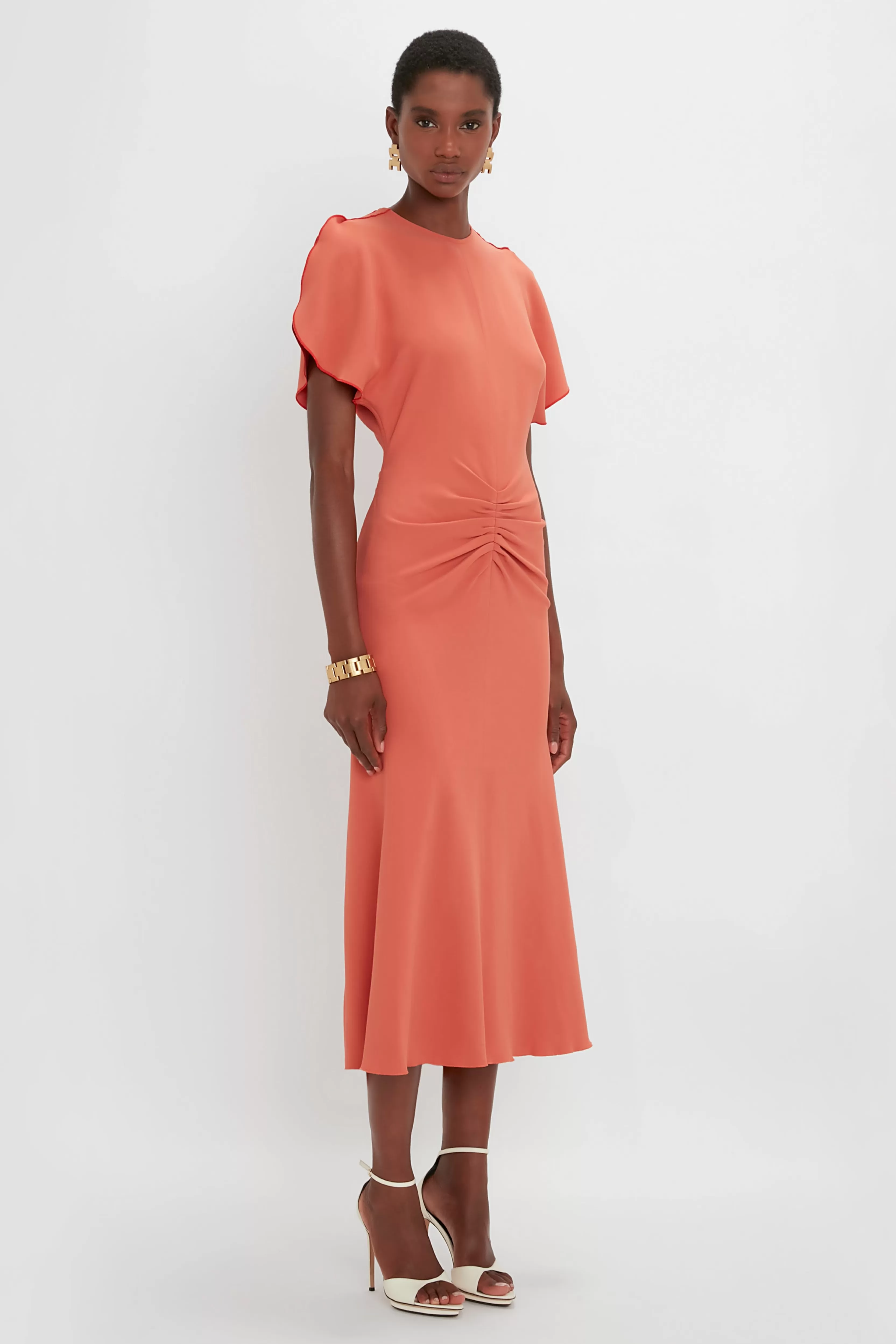 READY TO WEAR Victoria Beckham Occasionwear Edit | Pre Spring Summer 2024 | Dresses | The Gathered Waist Dress Edit | Gathered Waist Midi Dress In Papaya Orange